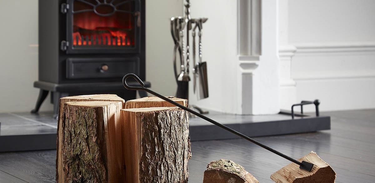 rustic logs in front of a fire place